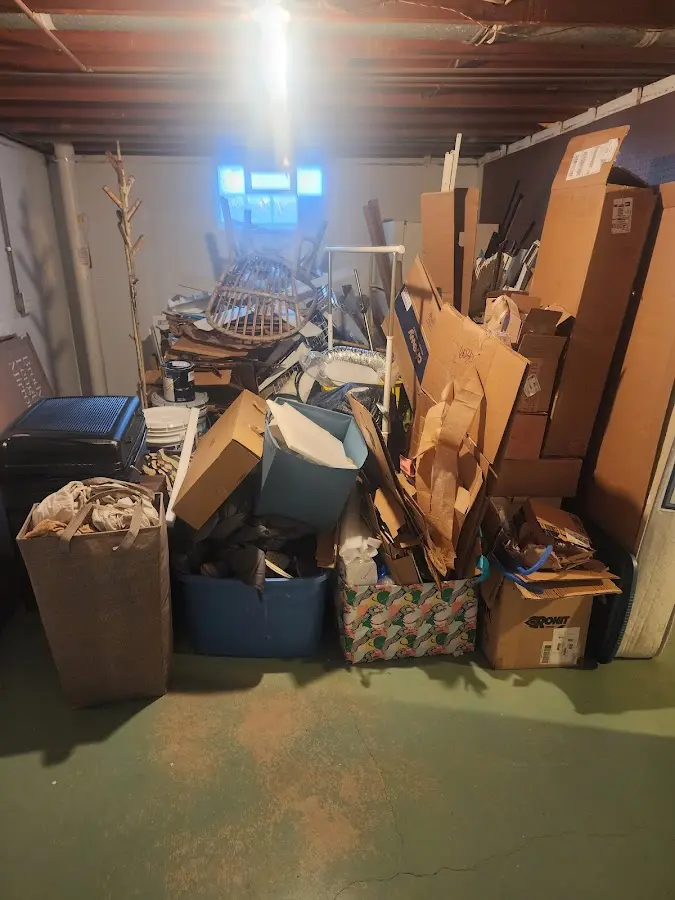 Roll-off dumpster container at job site for Construction Dumpster Rental in Bristol